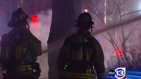 Firefighters at the scene of a blaze at an abandoned house in north Houston. Arson investigators say it may have been intentionally set