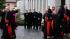 Final mass before conclave deliberation :: From left, US Cardinals Justin Francis Rigali, Donald Wuerl, Timothy Dolan, Francis George and Roger Mahony leave the North American College to go to the Vaticans Domus Sanctae Martae, the Vatican hotel where the cardinals stay during the conclave, in Rome, Tuesday March 12, 2013. Cardinals enter the Sistine Chapel on Tuesday to elect the next pope amid more upheaval and uncertainty than the Catholic Church has seen in decades: Theres no front-runner, no indication how long voting will last and no sense that a single man has what it takes to fix the many problems. (AP Photo/Alessandra Tarantino)