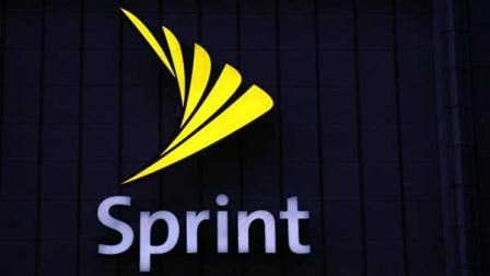 In this Aug. 7, 2008 file photo, an illuminated Sprint sign is shown at one of the companys stores in New York. Sprint Nextel Corp. is eliminating about 8,000 positions in the first quarter, it was announced Monday, Jan. 26, 2009, as it seeks to cut annual costs by $1.2 billion. (AP Photo/Mark Lennihan, File)