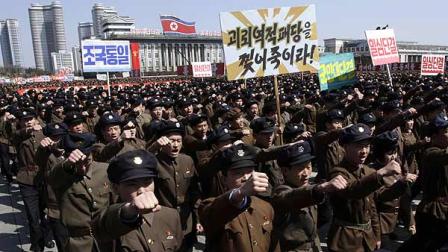 File image: North Koreans march through Kim Il Sung Square in downtown Pyongyang, NorthKorea, Friday, March 28, 2013. (AP Photo/Jon Chol Jin)
