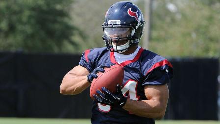 Houston Texans draft pick Trevardo Williams makes a catch during workouts at the Texans NFL football rookie mini camp Saturday, May 11, 2013, in Houston. (AP Photo/Pat Sullivan)