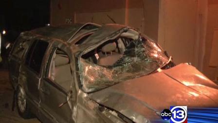 Police say a woman was killed when she lost control of her vehicle on the feeder road of I-45 at League Line.