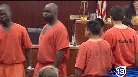Seven men charged after a suspected chop shop in northwest Houston was raided all faced a judge Thursday.