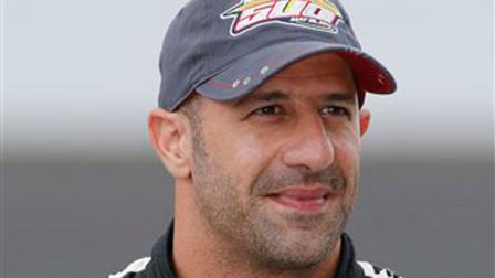 Tony Kanaan, of Brazil, poses after he qualified on the first day of qualifications for the Indianapolis 500 auto race at the Indianapolis Motor Speedway in Indianapolis, Saturday, May 18, 2013. (AP Photo/Dave Parker)