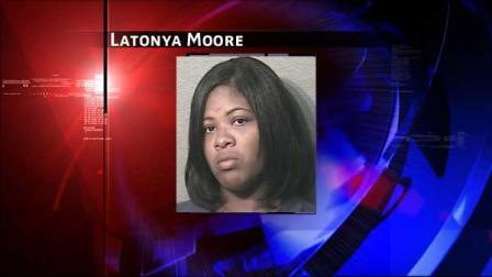 Investigators say Latonya Moore was high on PCP and put her baby on the car trunk, got in the car and drove away