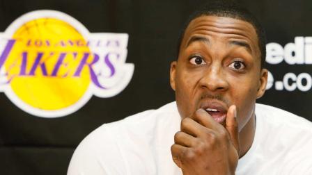 Los Angeles Lakers center Dwight Howard talks to reporters in El Segundo, Calif., Tuesday, April 30, 2013. The Lakes lost their first-round NBA basketball playoff series to the San Antonio Spurs. (AP Photo/Damian Dovarganes)