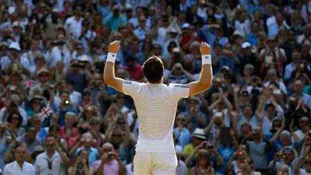 Andy Murray of Britain reacts as he defeats Novak Djokovic of Serbia during the Mens singles final match at the All England Lawn Tennis Championships in Wimbledon, London, Sunday, July 7, 2013. (AP Photo/Kirsty Wigglesworth)