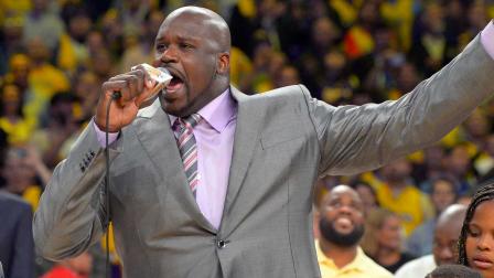 Former Los Angeles Lakers center Shaquille ONeal gestures as they retire his jersey during the half of the Lakers NBA basketball game against the Dallas Mavericks, Tuesday, April 2, 2013, in Los Angeles. (AP Photo/Mark J. Terrill)