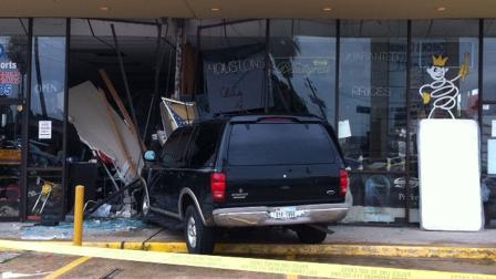 A Ford Explorer crashed into Southwest Mattress and Texotic Motorsport