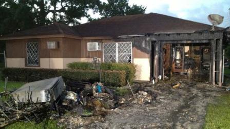Arson investigators are on the scene of a house fire in northeast Houston.