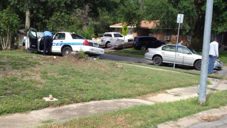 Two officers in a police cruiser and a passenger in another car were injured when the vehicles collided in southeast Houston