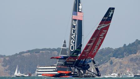 Emirates Team New Zealand nearly capsizes next to Oracle Team USA