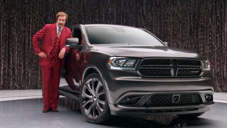 This undated photo provided by Chrysler shows Will Ferrell as Anchorman character Ron Burgundy in an advertisement for the 2014 Dodge Durango.