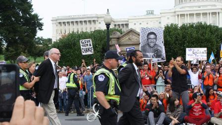 Congressman Al Green was the first of eight members of Congress and at least 100 other individuals arrested