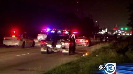 Investigators at the scene of a fatal auto-pedestrian crash in north Harris County