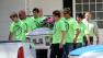 Pallbearers wearing anti-bullying t-shirts carry the casket of Rebecca Sedwick