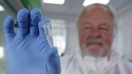 Oxford University genetics professor Bryan Sykes posing with a prepared DNA sample taken from hair from a Himalayan animal