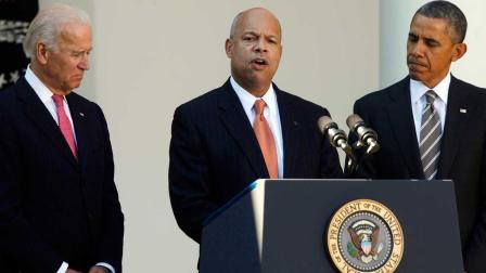 President Barack Obama stands with Jeh Johnson, his choice for the next Homeland Security Secretary, and Vice President Joe Biden, in the Rose Garden at the White House in Washington, Friday, Oct. 18, 2013. Johnson was general counsel at the Defense Department during the wars in Iraq and Afghanistan. (AP Photo/Charles Dharapak)