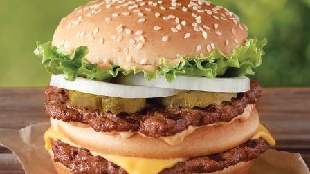 This undated image provided by Burger King shows the Big King sandwich. Burger King says its an addition to the permanent menu rolling out this week. (AP Photo/Burger King)