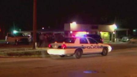Police say a man fired shots into the air and then beat a victim with his gun outside this club before fleeing