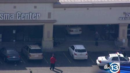 Car into building