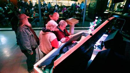 Family members pay their last respects to Jimmy Lehr at the All Around Bar in Taylor, Mich. on Thursday, Feb. 13, 2014