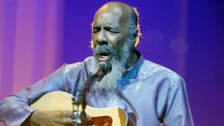 In this May 1, 2008 file photo, Richie Havens plays at the opening night ceremony during the 61st International film festival in Cannes, southern France. Havens, who sang and strummed for a sea of people at Woodstock, has died at 72. His family says in a statement that Havens died Monday, April 22, 2013, of a heart attack. (AP Photo/Jeff Christensen, file)