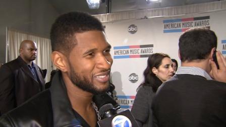 Usher speaks backstage at the 2010 American Music Awards in Los Angeles.