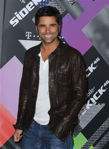 Actor Henry Winkler poses at the premiere of...