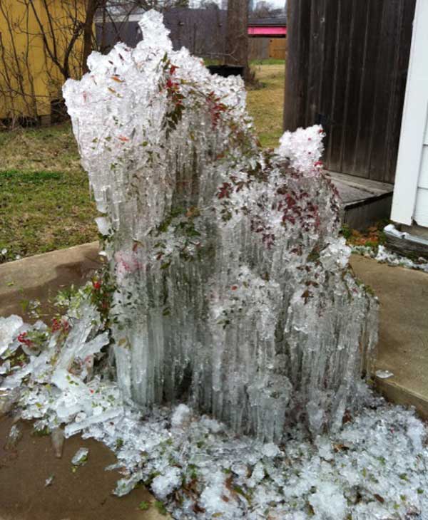 Frozen fountain in a Katy backyard.