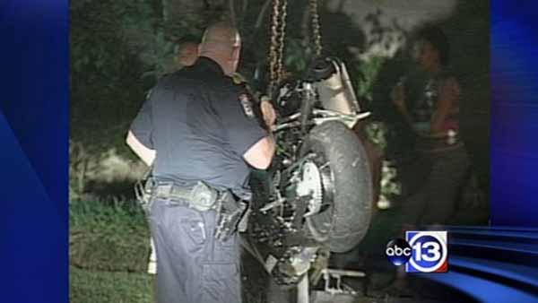 A motorcyclist died after apparently losing control overnight and slamming into a wooden fence.