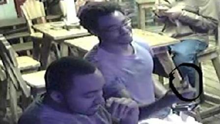 Police released this still image of the suspects in a purse snatching that happened in November of last year.
