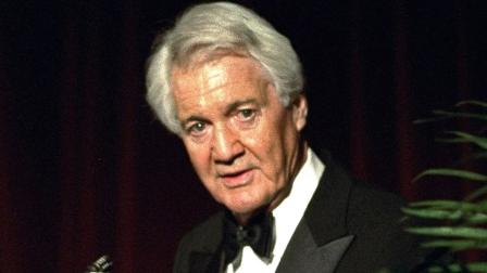Pat Summerall, completing his 34th and final season with CBS, receives an award for lifetime achievement at the 1994 Sports Emmy Awards in New York on Tuesday, April 19, 1994. (AP Photo/Rob Clark)