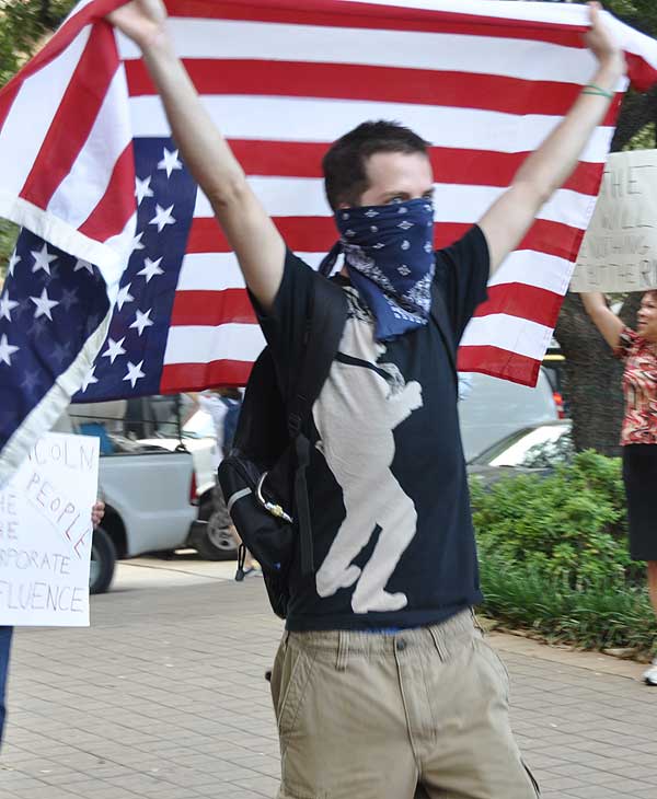 Houston protesters join the Occupy movement to...