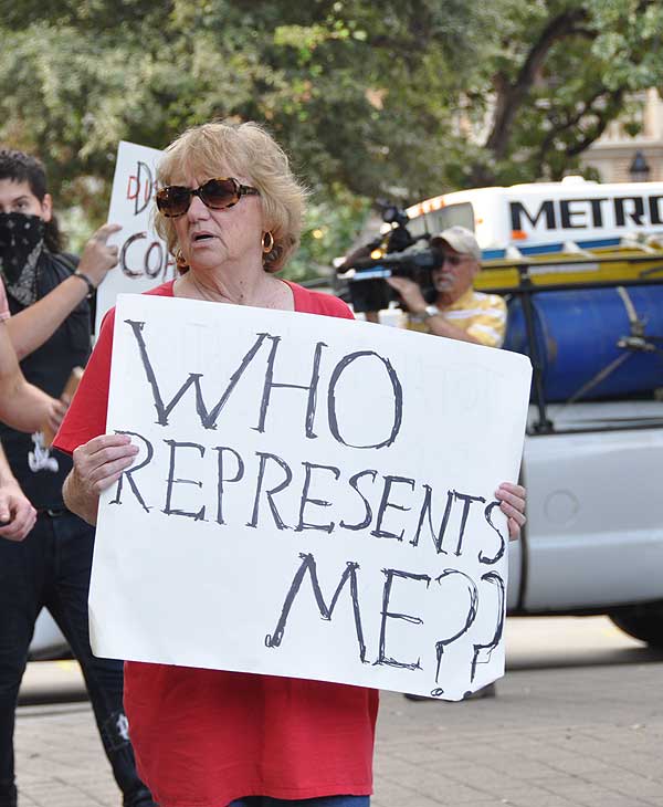 Houston protesters join the Occupy movement to...
