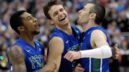 Florida Gulf Coasts Dajuan Graf, from left, Eddie Murray and Brett Comer celebrate after winning a third-round game against San Diego State in the NCAA college basketball tournament, Sunday, March 24, 2013, in Philadelphia. Florida Gulf Coast won 81-71. (AP Photo/Michael Perez)