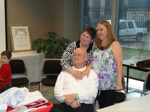 Shannon Lenox listens for the first time to her...