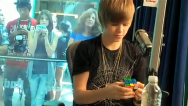 Bieber can solve a Rubik's cube in under a minute.