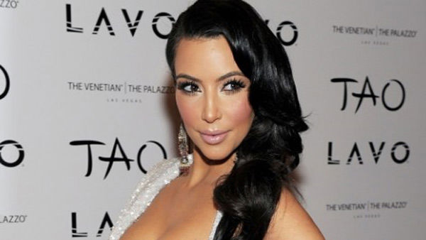 Kim Kardashian poses at Tao nighclub at the...