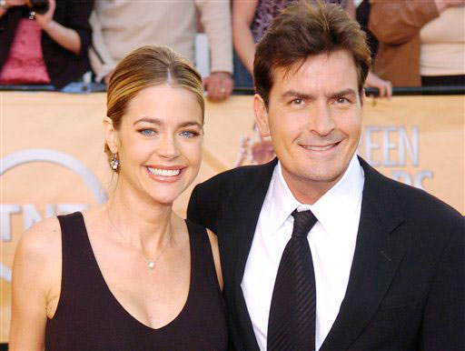 Charlie Sheen arrives with his wife Denise...