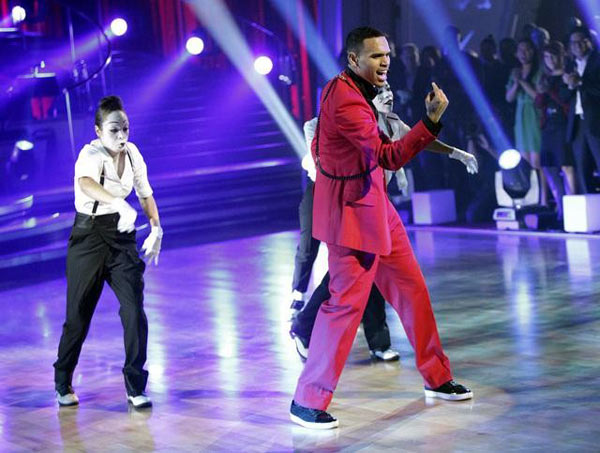 Chris Brown stopped by to perform his hit single 'Forever' and his newest hit 'Yeah 3X,' from his new album, 'F.A.M.E.,' on 'Dancing With The Stars: The Results Show,' Tuesday, March 29, 2011.