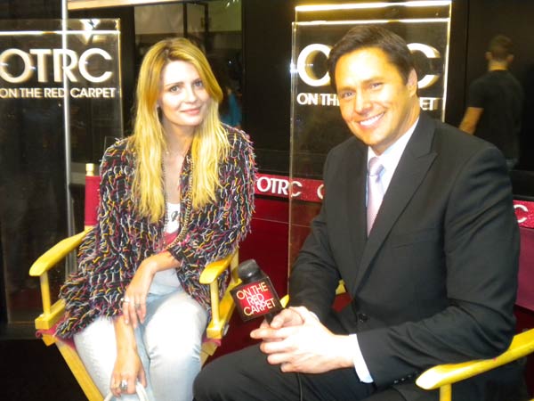 'On The Red Carpet' host Chris Balish interviews...