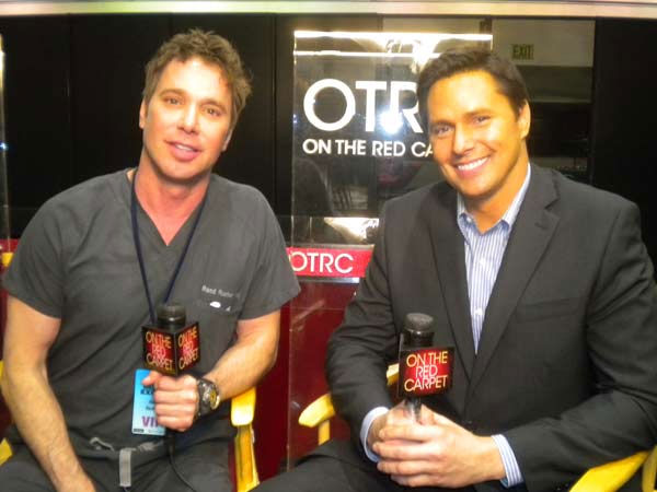 Rand Rusher of 'Pretty Hurts' talks to 'On The Red Carpet' host Chris Balish at the Reality Rocks Expo at the Los Angeles Convention Center on April 10, 2011.