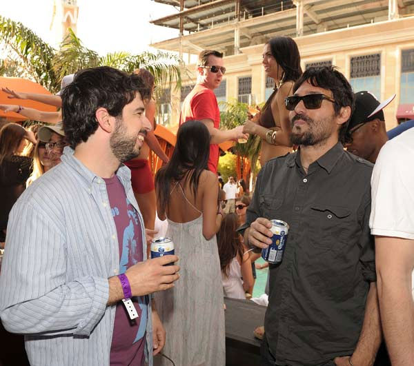 Jordan Bratman (L) attends TAO Beach season...