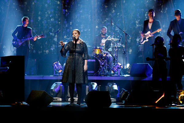 Grammy Award-winning artist Adele takes the...