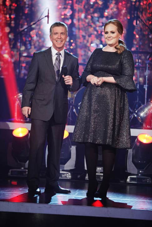 Grammy Award-winning artist Adele takes the stage to sing her hit single 