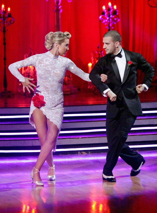 Chelsea Kane and her partner Mark Ballas dance...