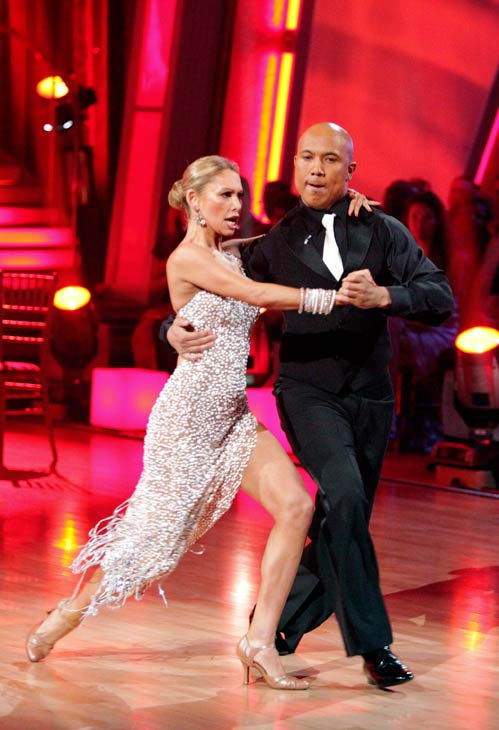 Hines Ward and his partner Kym Johnson dance a...