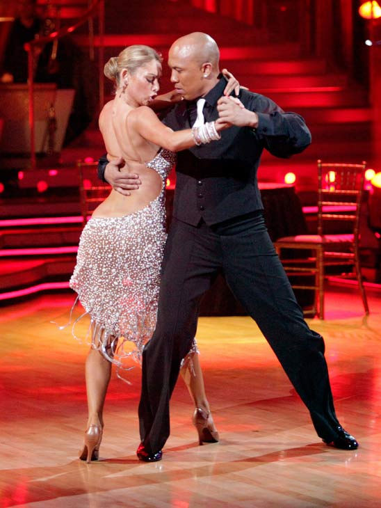 Hines Ward and his partner Kym Johnson dance a...