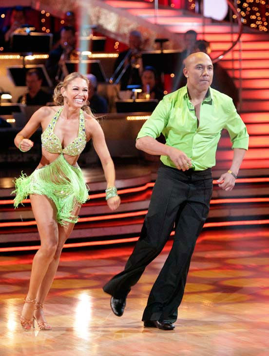 Hines Ward and his partner Kym Johnson dance a...